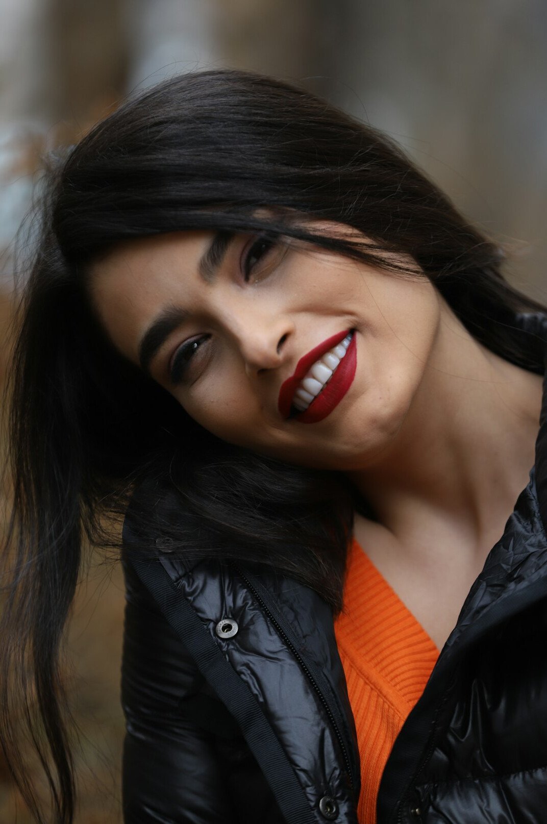 Turkish woman media trainer smiling in a professional headshot